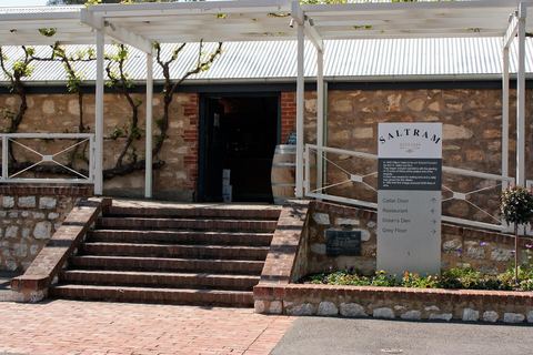 The entrance to a cellar door building with stone steps